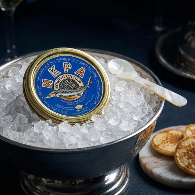 Bowfin caviar served, naturally true-black roe.
